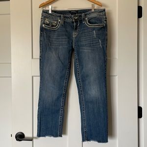 Capris w/either frayed bottom or can be rolled up.  They are size 11/12 L 25.